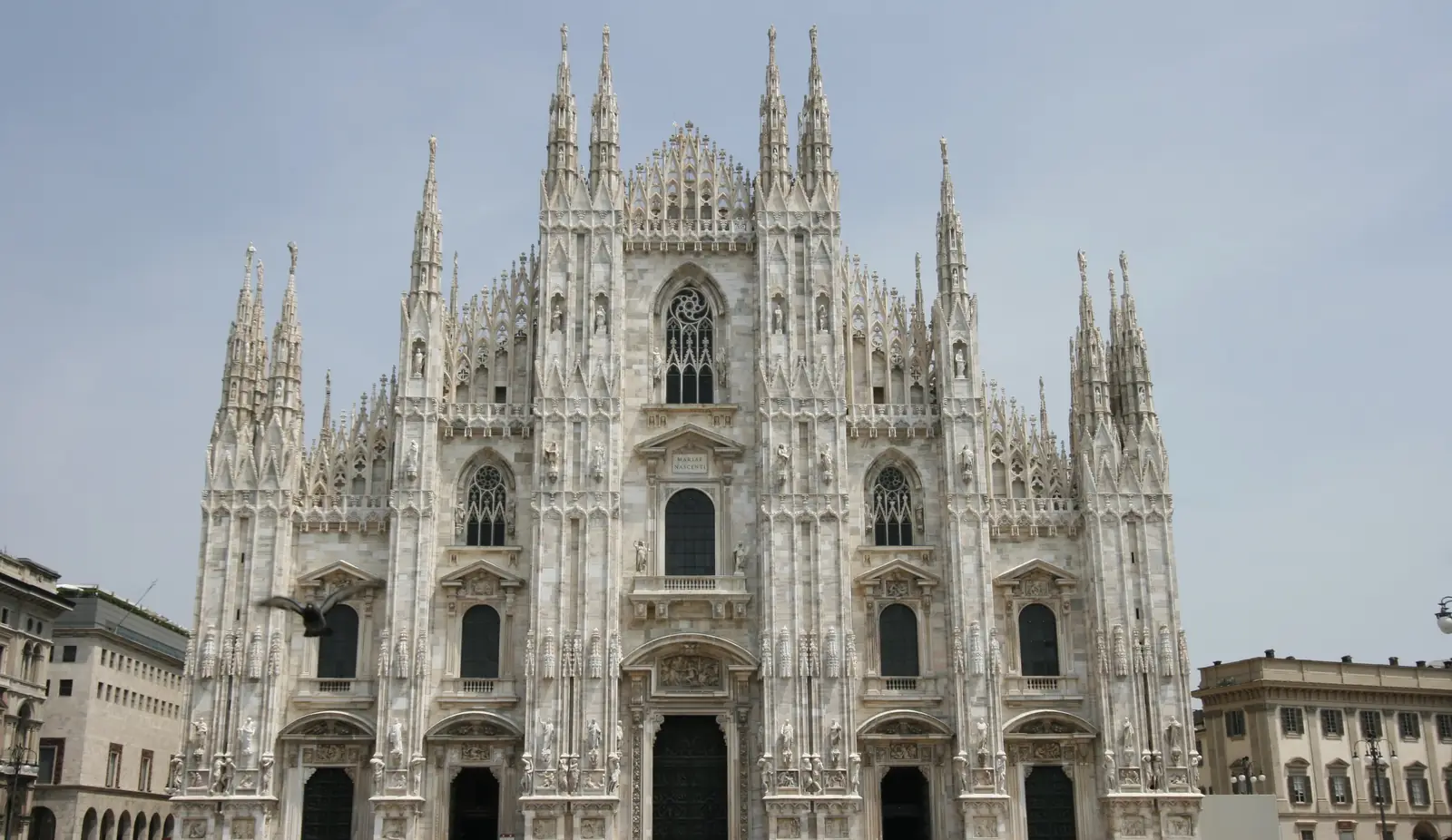 The façade of Milan Cathedral against the sky